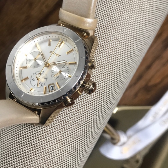 Gold and silver face with beige band